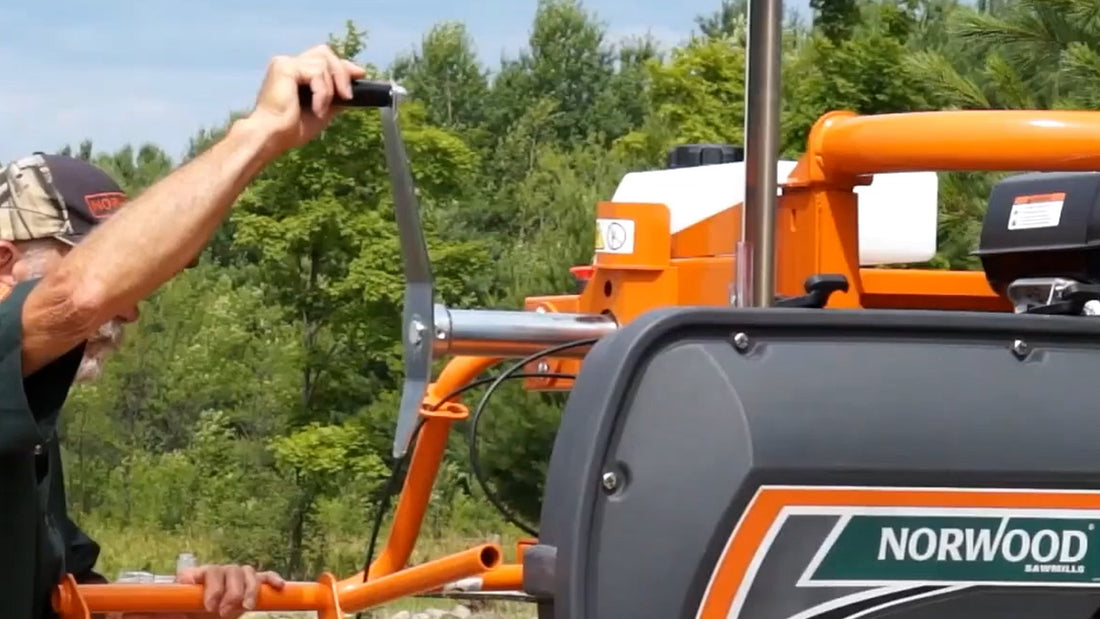 Infinitely adjustable patented auto-locking sawhead on the Norwood Sawmills LumberMate LM30 portable sawmill.