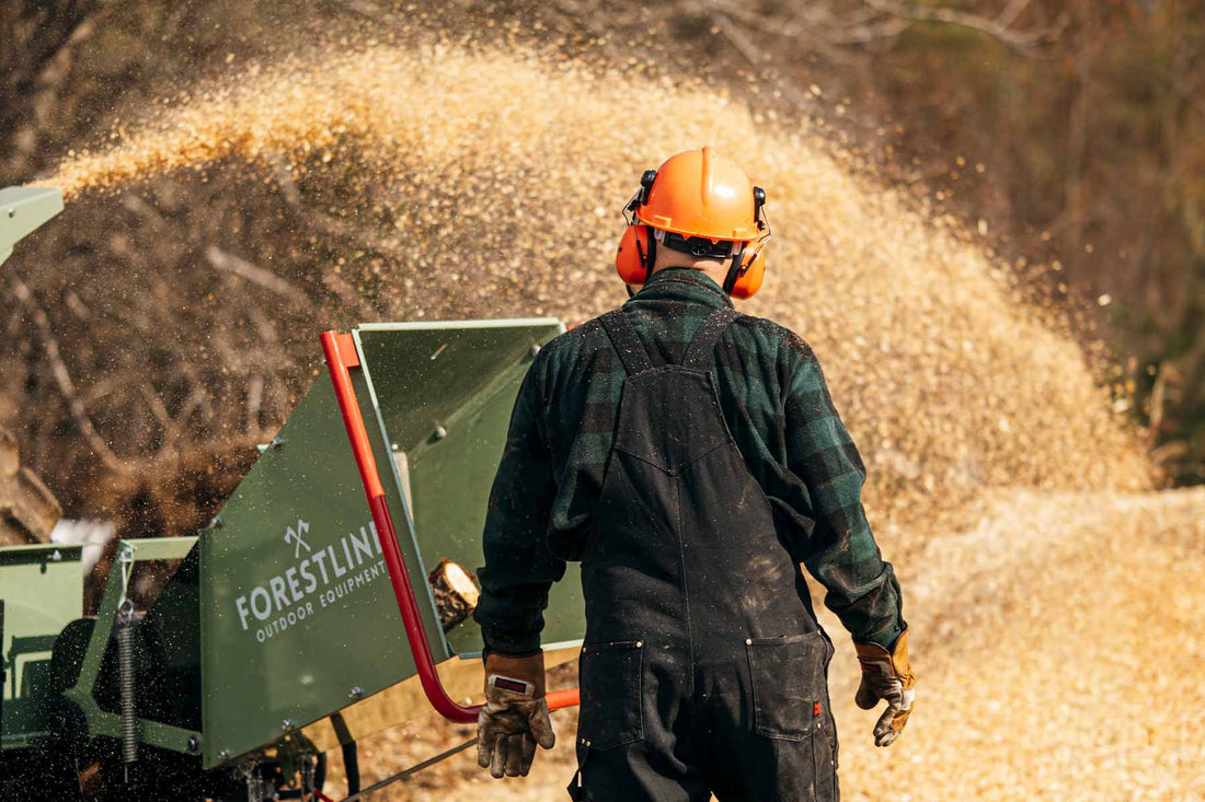 Adjustable discharge deflector