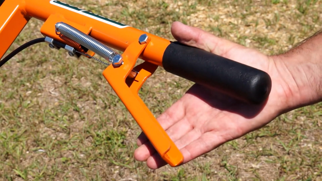 Norwood's patented throttle actuator for the PortaMill PM14 that provides operator control over the chainsaw -squeeze to cut and release to idle. 